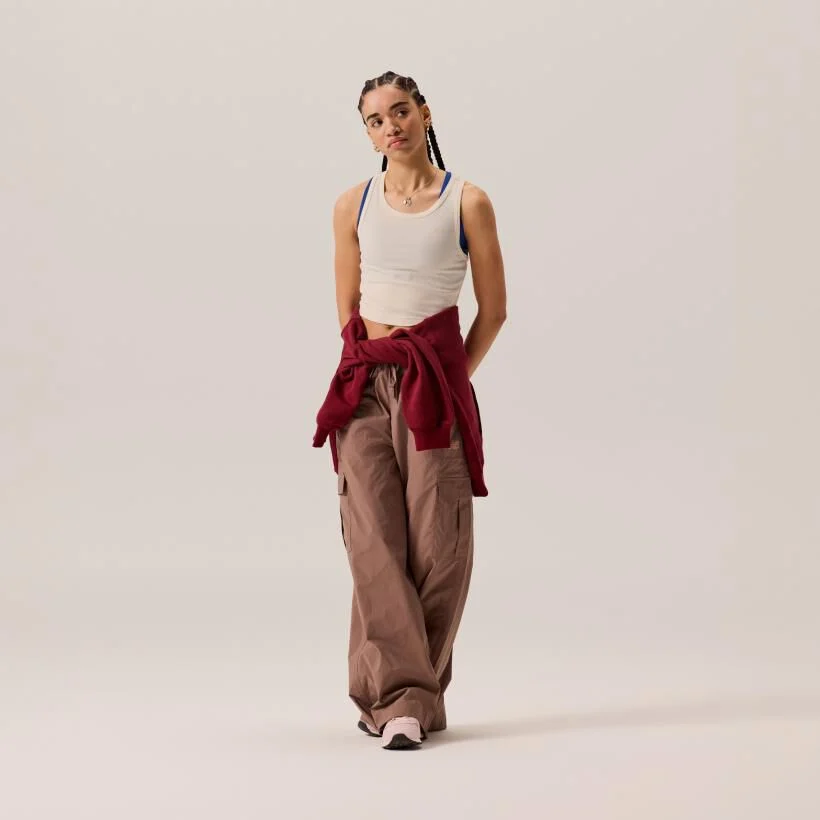 Women standing with beanie and sweat suit